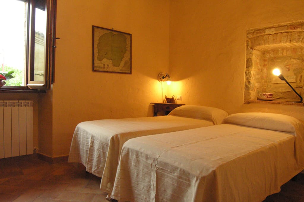 Camera da letto con letti singoli unibili in matrimoniale