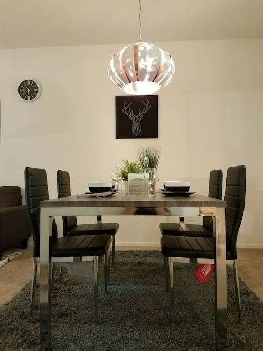spacious dining table accommodating up to four guests