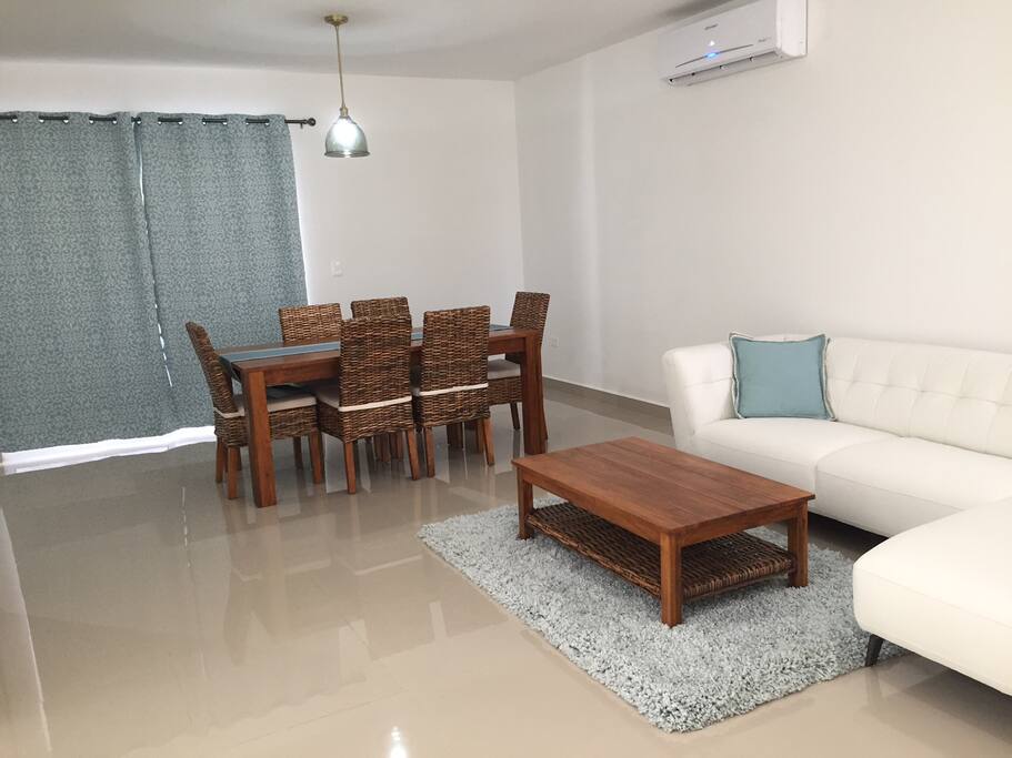 Dinner table and living room.