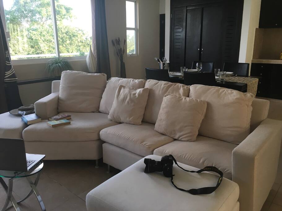 Main area with living room, dining area and kitchen
