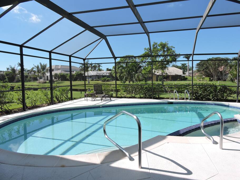Pool View of Naples Lake Home