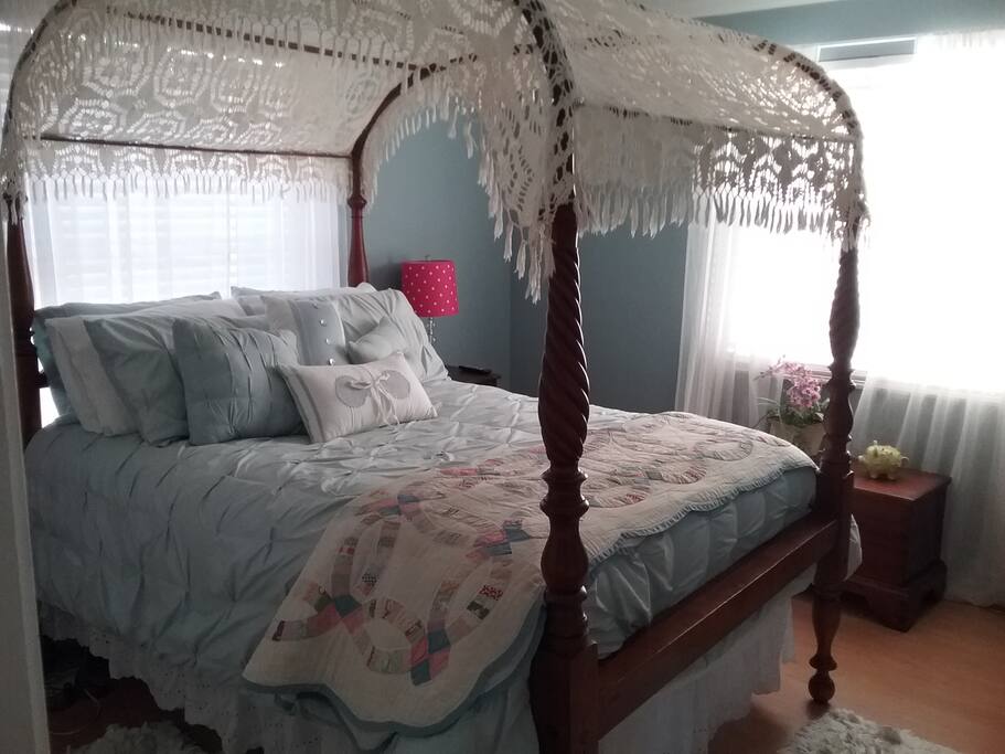 Bedroom with canopy bed
