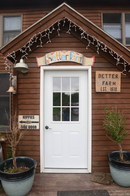 The front door of Better Farm's main house, which Tiny Home guests have full access to for hot showers, bathrooms, and common area space. Breakfast is also served in the main house at 9 am.