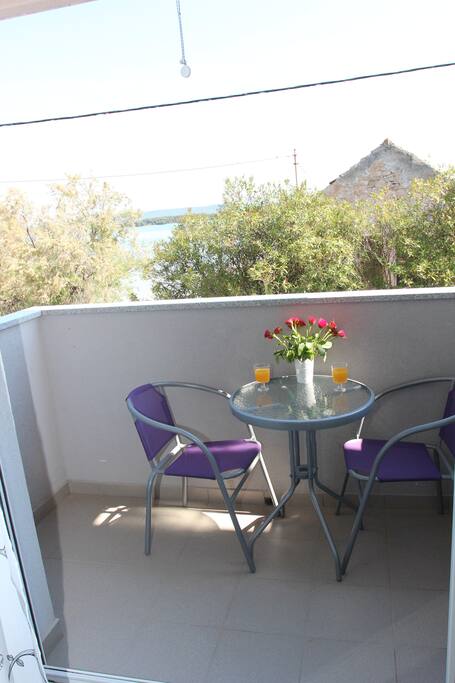 private balcony with spectacular sea view.