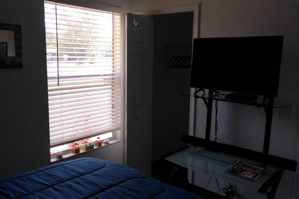 Window view. Let the sun shine in...walk-in closet...Cozy very room with a new 32' HDTV. soundbar.