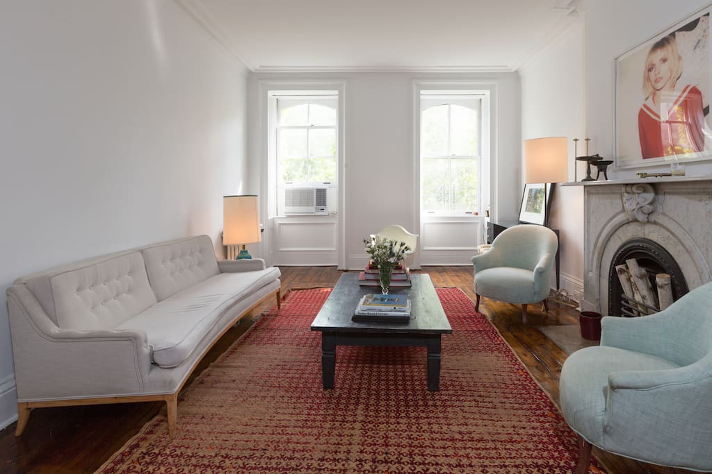 Living room: quiet and luminous. European antique furnitures. Facing beautiful tree lined street and church.