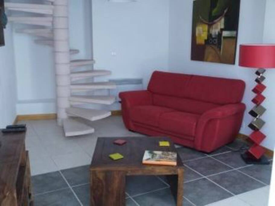 Staircase to bedroom & bathroom on level