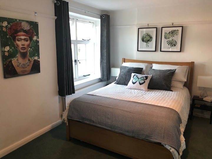 Priory Bedroom. King sized bed with plenty of floor space and ensuite shower room