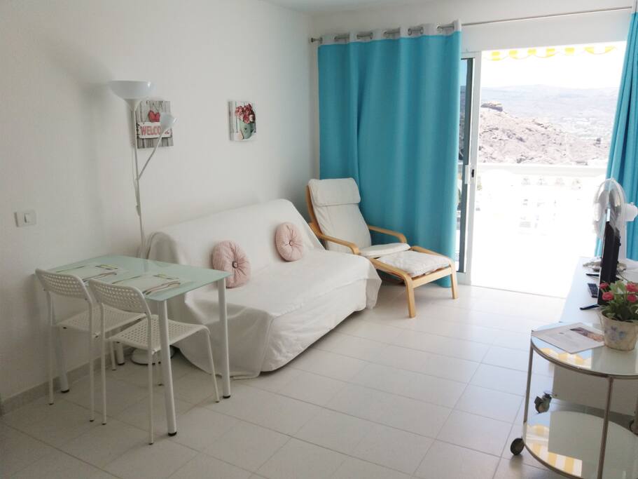 Living area with sofa bed and Flat Screen TV (Spanish, UK, German channels)