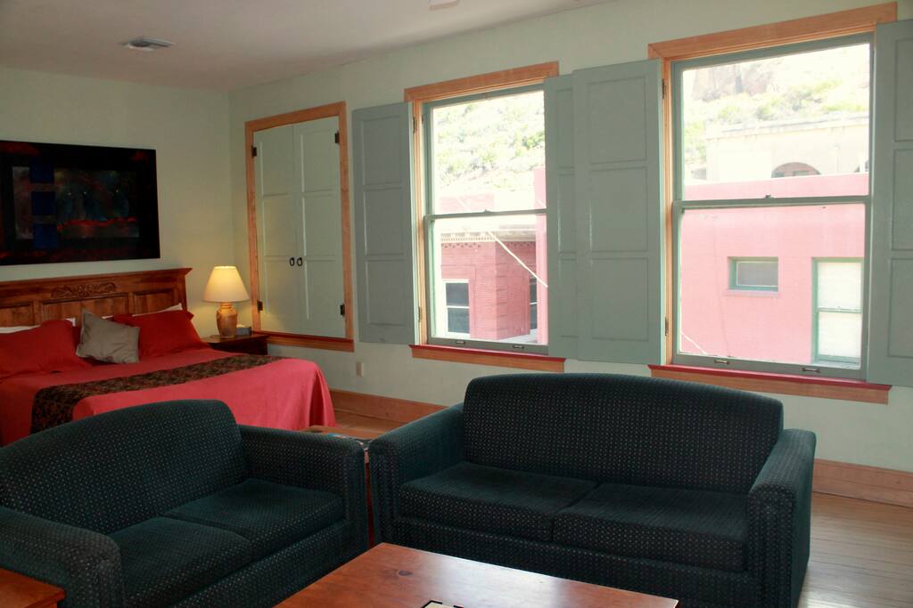 King Bed in an alcove off of the Living Room (Full size sofa bed), Suite 8