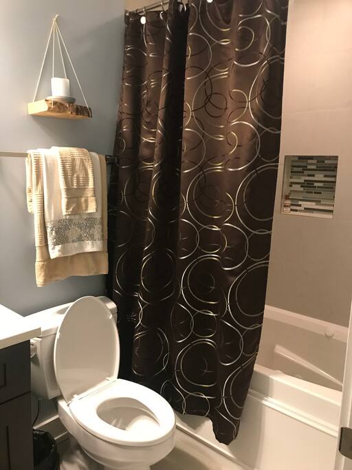 Private one full bathroom with jacuzzi tub/shower combination.