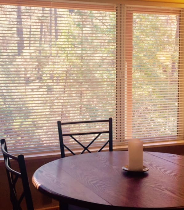 Dining table with forest view