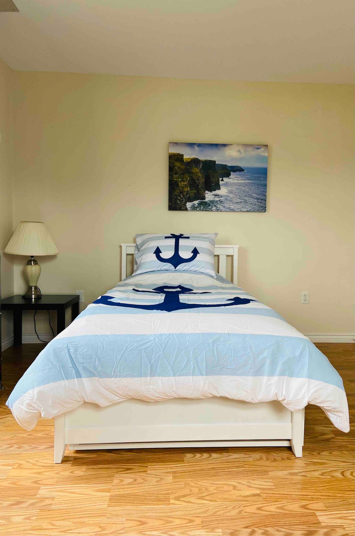 "Ireland" room with two trundle beds and views over Rustico Bay