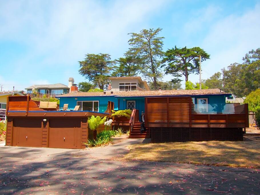 View looking toward the house, note the big decks, and double size lot