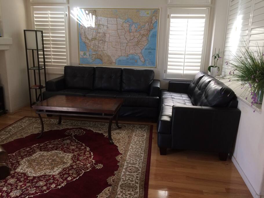We share the living room. Please have a sit and let's have a tea together.