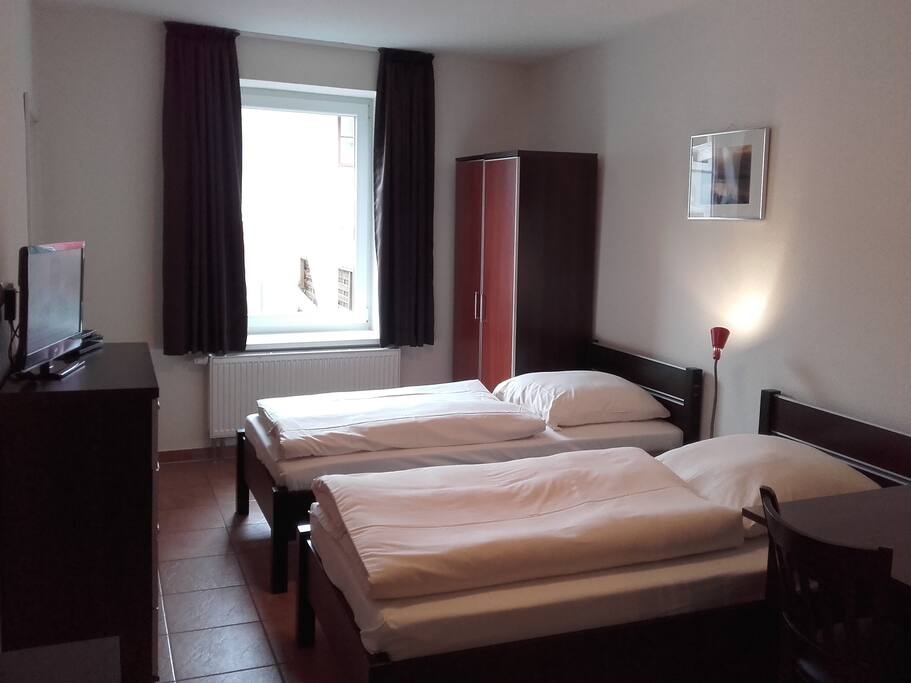 Schlafzimmer mit 3 Einzelbetten