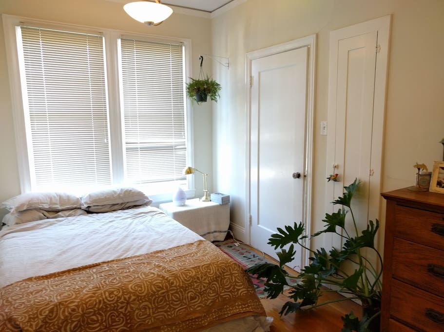 Full-sized bed in separate bedroom