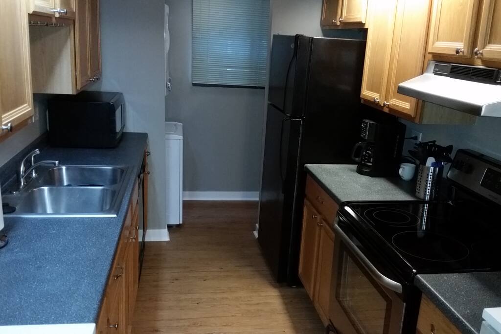This full kitchen is perfect for preparing any meal. Dishwasher, microwave, ice-maker, Keurig, standard coffee brewer and all utensils are provided.