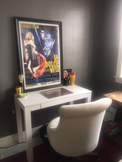 Inspiring and creative workspace (printer, shelves, cork board etc.)