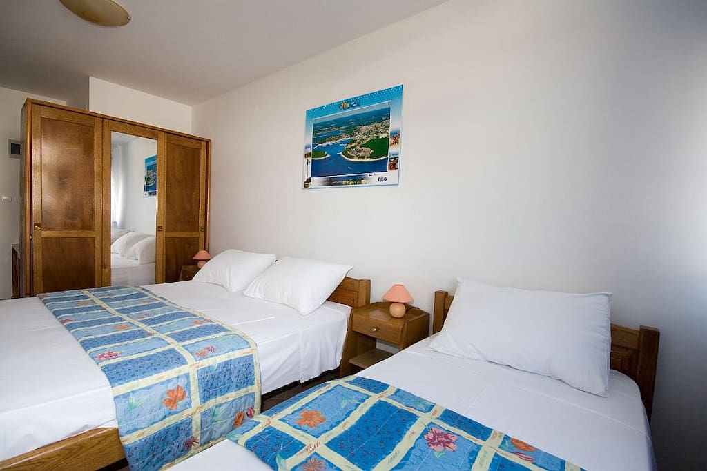 the sleeping area, double bed and single bed