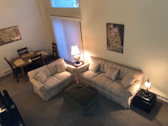 Private Master and Bath, living/dining/media area