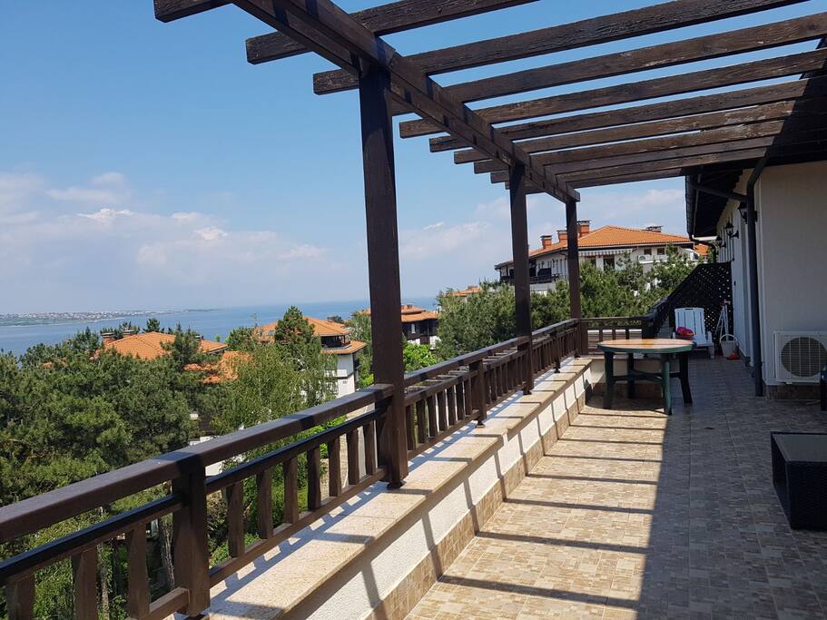 The balcony which connects the two studio apartments