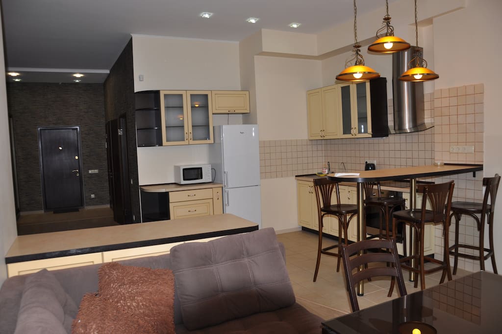 Living area and fully equipped kitchen