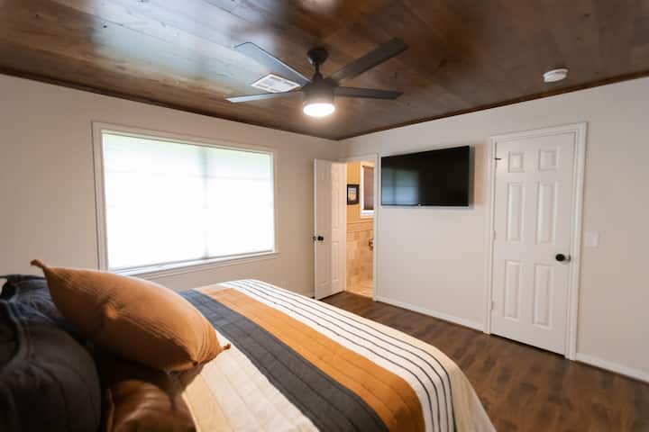 Bedroom two with private bath and king size bed