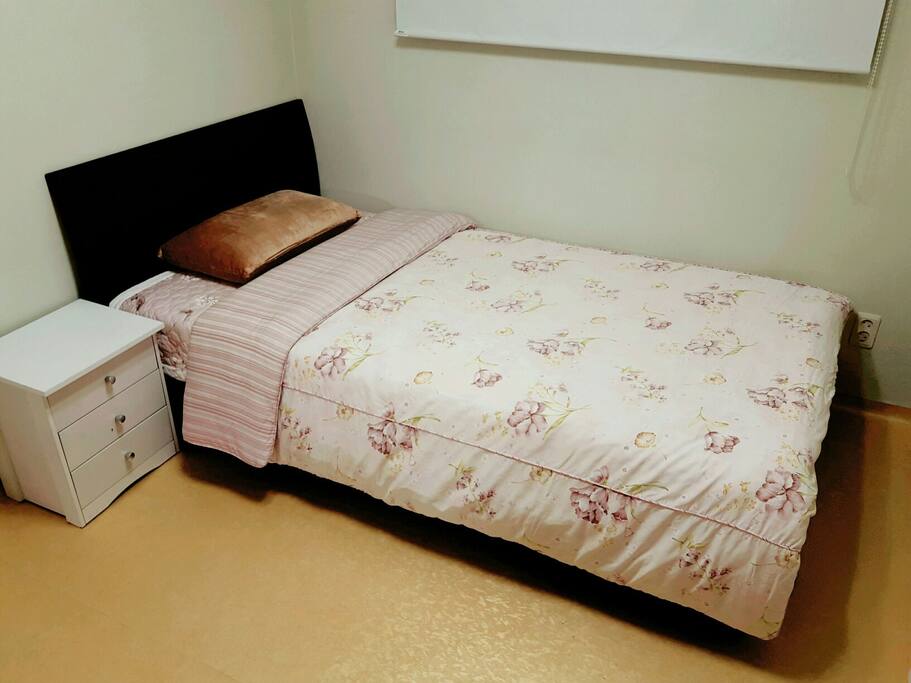 1 super single size bed. It is really soft and cozy. and white small drawer.