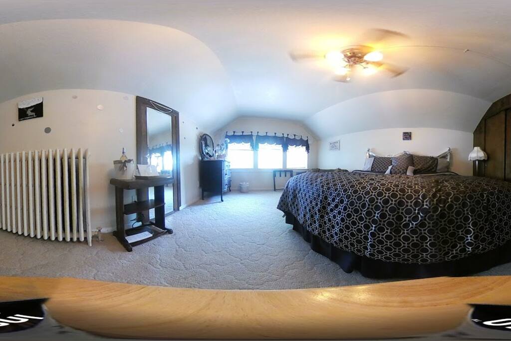 West Egg suite with king size bed, whirlpool tub and sofa sleeper.