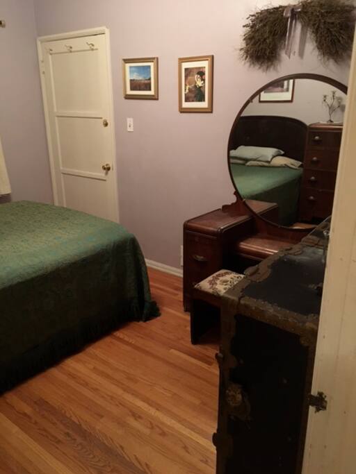 Bedroom, door leads to side porch