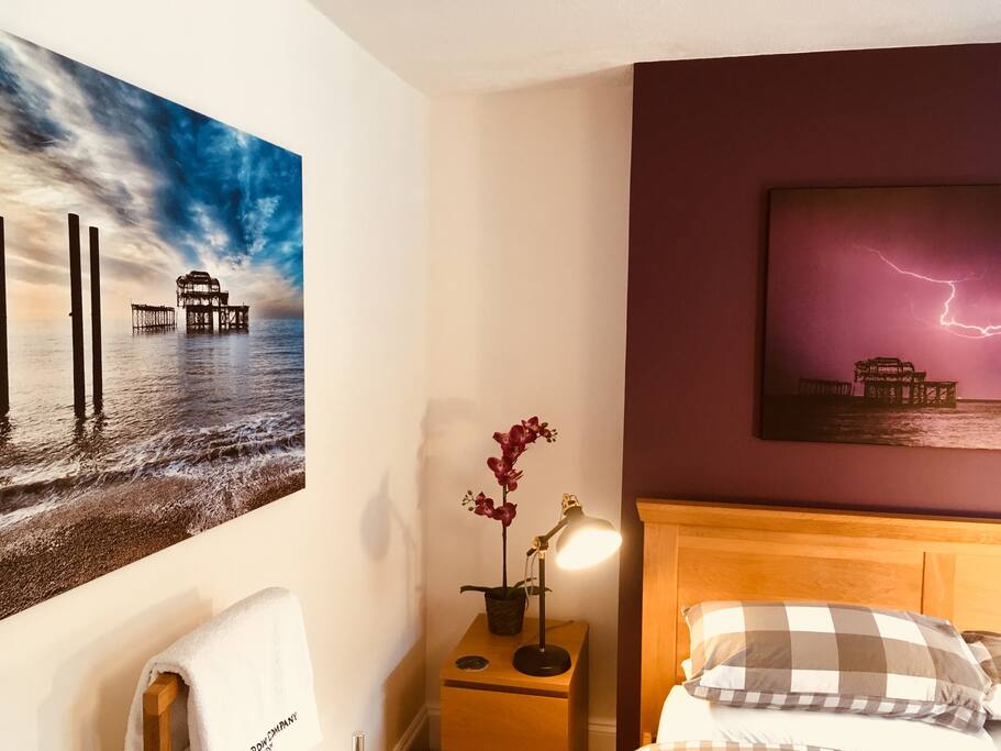 Light room decorated with local art