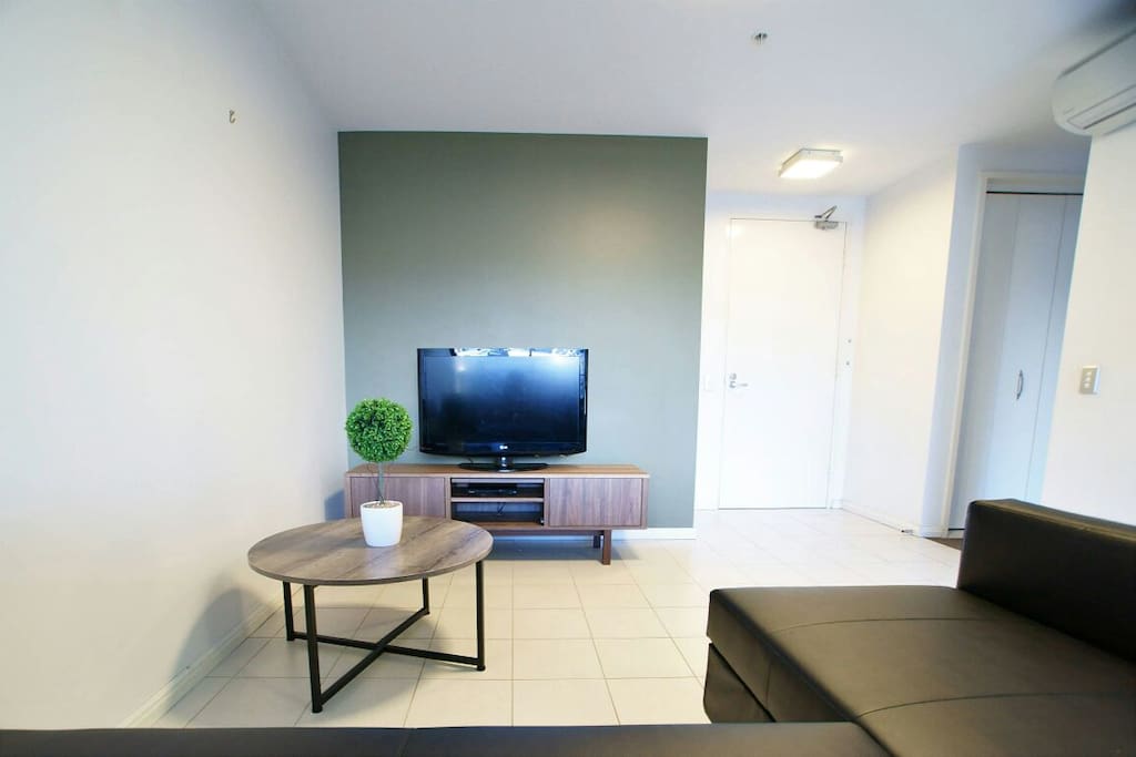 Lounge Room with sofa and TV