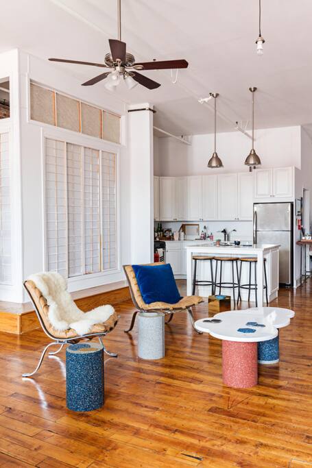 The living area with marble coffee table and various seating