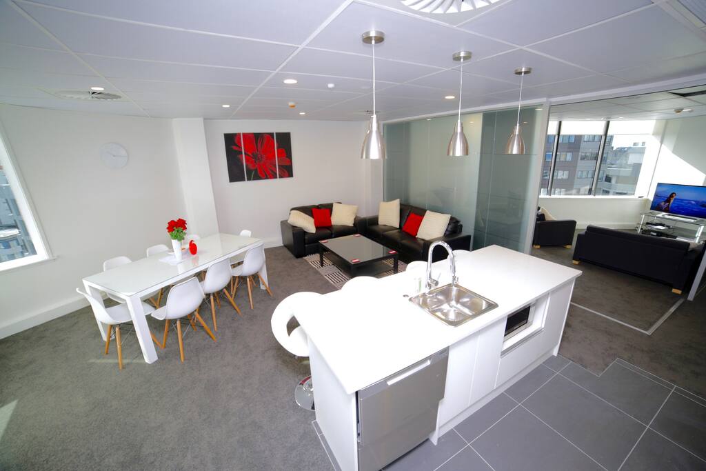 Kitchen Dining Area with TV Room / 5th Bedroom in the background