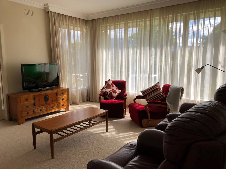 Comfortable seating for six people in the sun filled lounge