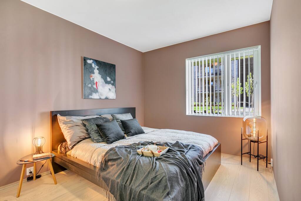 The master bedroom with a huge quality (180 cm) bed and two large wardrobes.