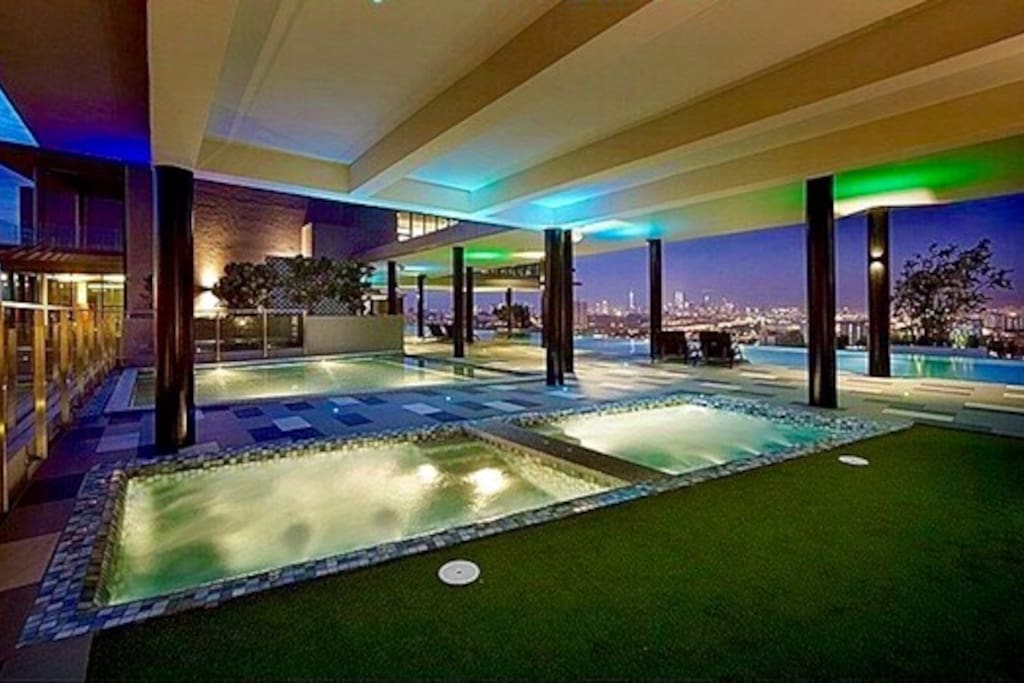 Jacuzzi, spa lounge & infinity swimming pool-night time view