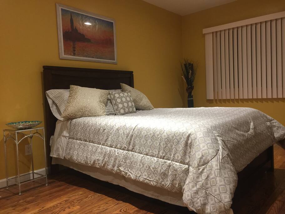 Now we have a queen sized bed in our inviting, large room.