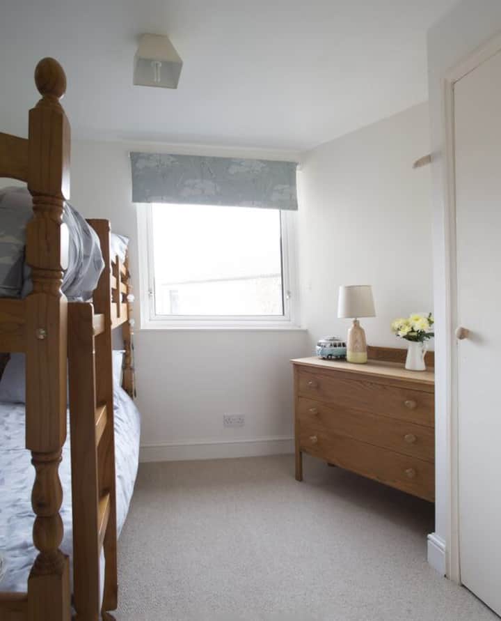 Bunk room with two full size adult beds.