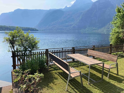 Apartment with balcony and private garden by the lake