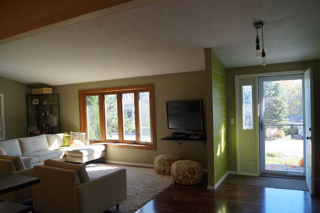 Living room with 47" Flat screen TV and couch for additional sleeping