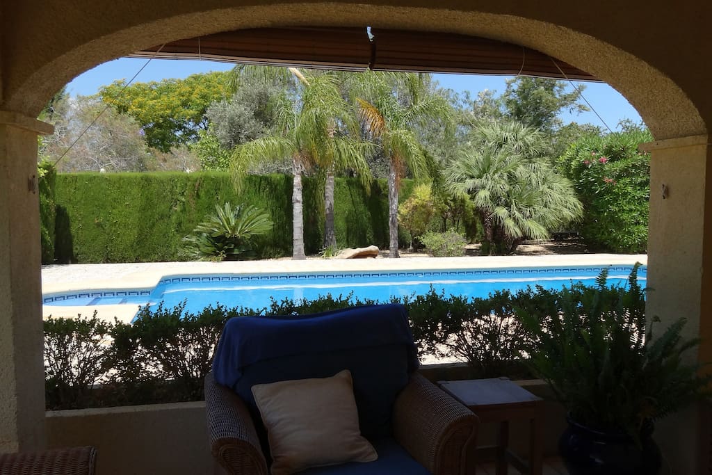 View from the covered terrace of the pool.