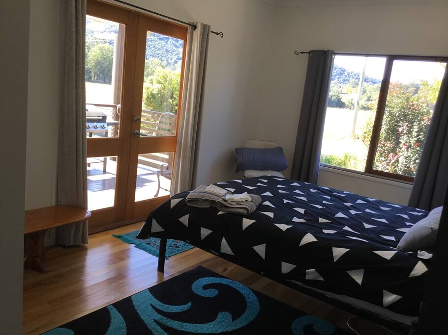 Main bedroom, queen bed, French doors are the entrance to the rooms