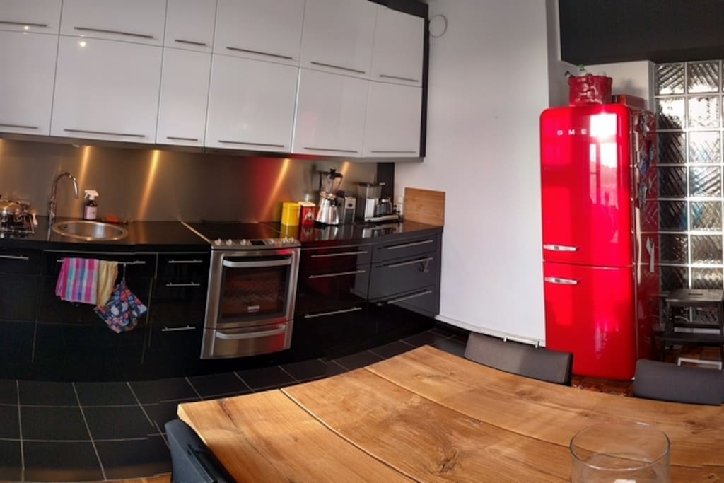 Kitchen again from a perspective where you can see Smeg, the refrigerator.