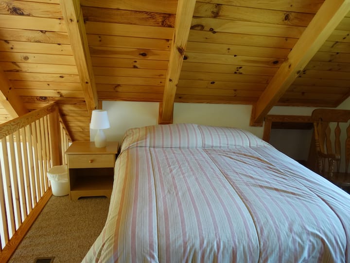 Queen bed in loft