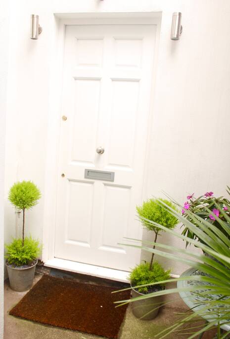 The apartment has a private front door