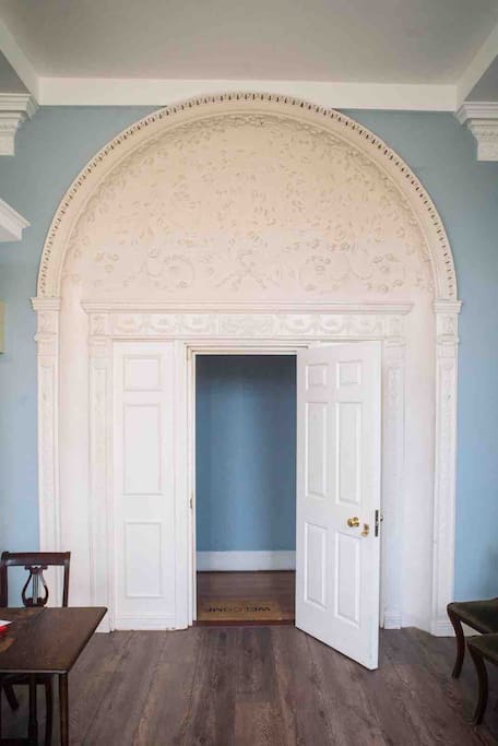 18th century papier-mâché moulding on arched doorway