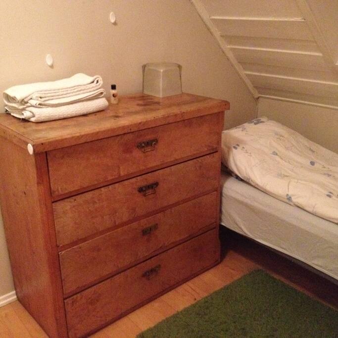 A chest of drawers where you can keep your clothes.