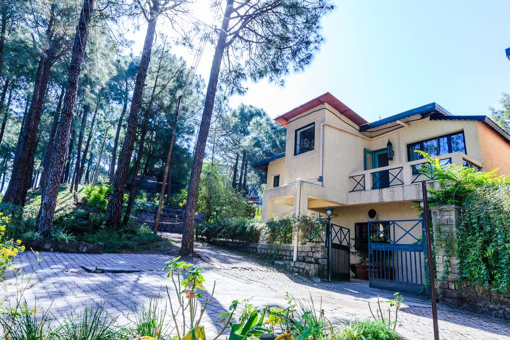 Entry facade of the villa which borders a thick pine forest with some lovely hill walks